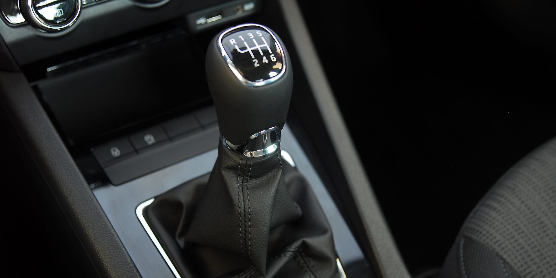Abrasion & chemical resistant coated gear knob motif.